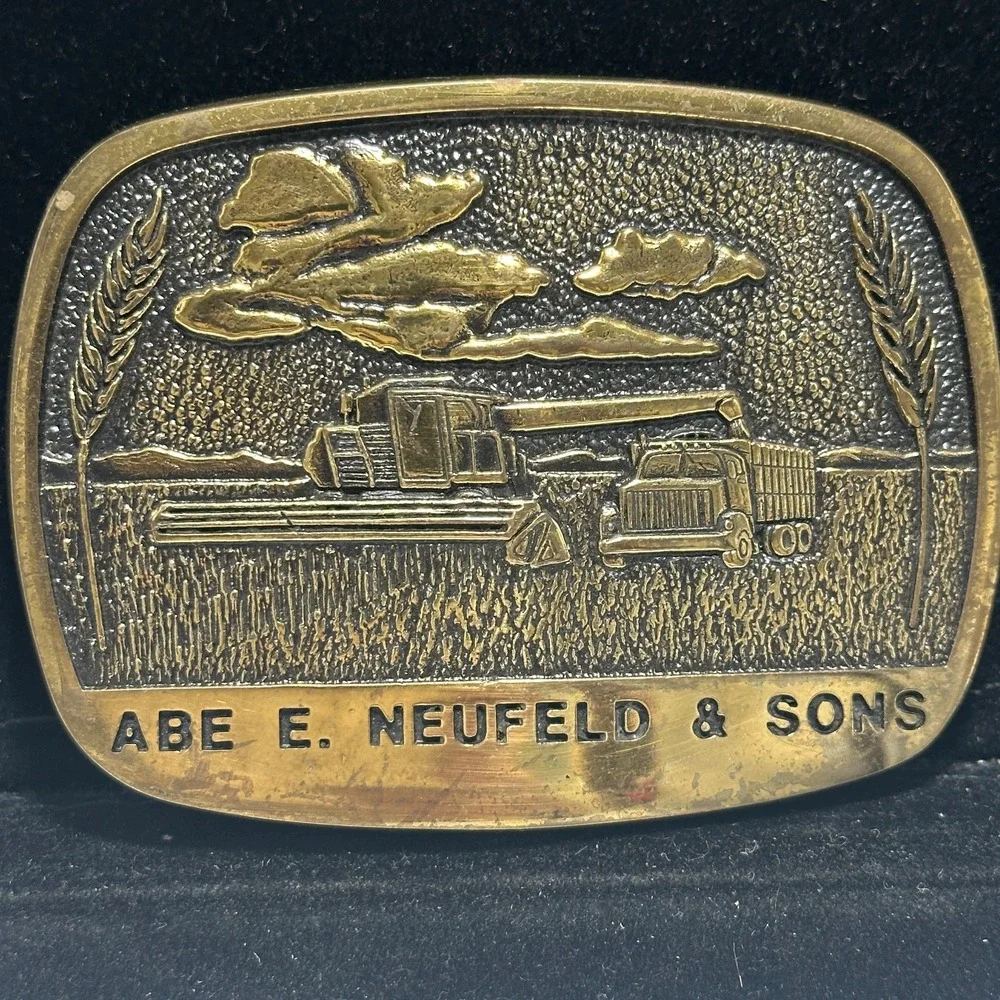 Vintage Abe E Neufeld & Sons Brass Combine Wheat Farm Advertising Belt Buckle